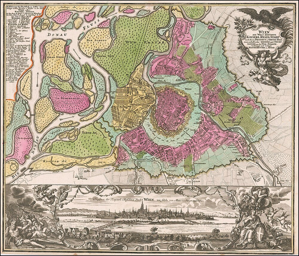 Antique detailed map of Vienna city with colorful districts and historical river layout, including Donau Fluss and city fortifications.