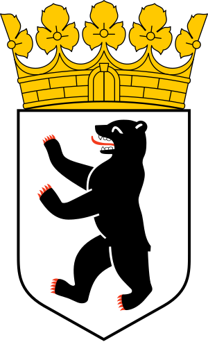 Black Bear Coat of Arms with Golden Crown Coat of arms featuring a black bear with red claws and tongue on a white shield topped by a golden crown with floral decorations