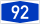 Blue rectangular road sign with white number 92 indicating highway or route number for navigation and travel directions