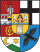 Heraldic coat of arms with lion, fleur-de-lis, and bird Coat of arms featuring a lion, fleur-de-lis, and a black bird on a shield divided into four quadrants with red and yellow colors