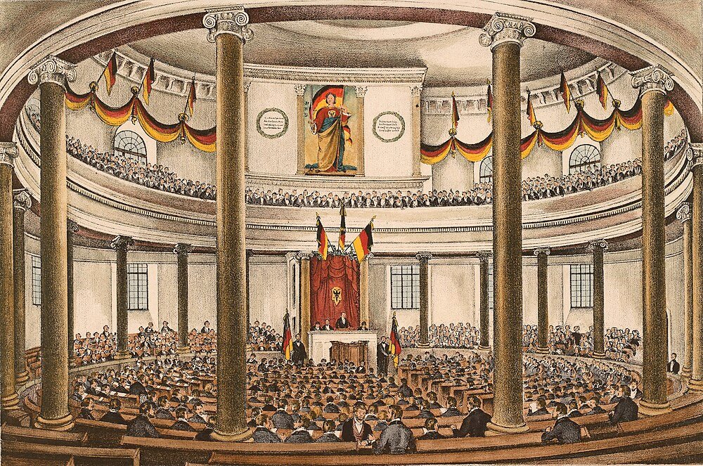 Historic German Assembly in Grand Hall Historic illustration of a large assembly in a grand hall with German flags and classical columns, depicting a political gathering.