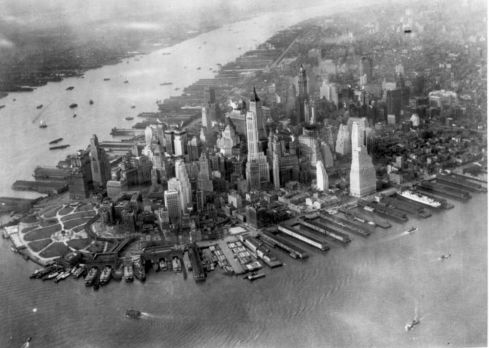 Historic Lower Manhattan Skyline Aerial View Aerial view of historic Lower Manhattan skyline with early 20th century skyscrapers and waterfront piers