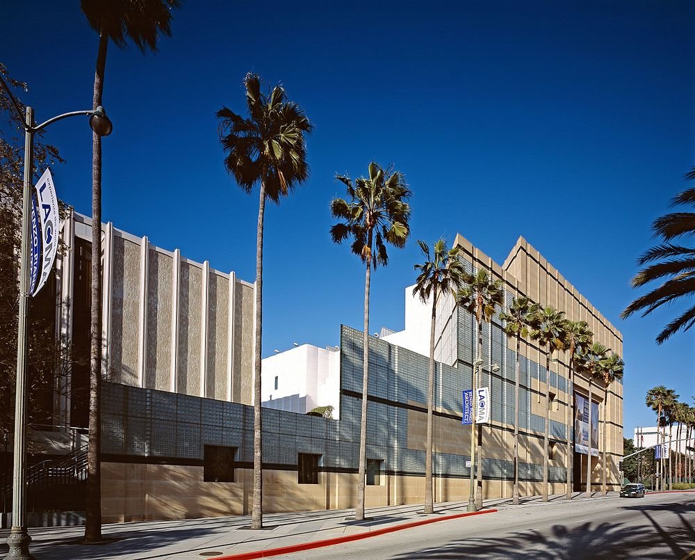 Los Angeles Modern Art Museum Exterior Modern art museum building with palm trees and clear blue sky on a sunny day in Los Angeles