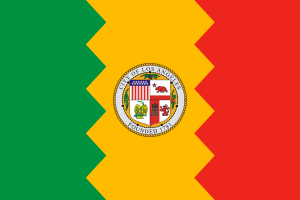 Flag of Los Angeles with green, yellow, and red zigzag vertical stripes and city seal in the center, symbolizing heritage and culture