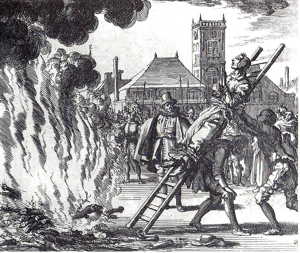 Medieval woman burned at stake execution Historical black and white illustration of a woman being burned at the stake with a crowd watching in a medieval town square