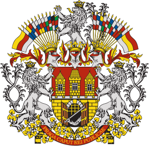 Detailed coat of arms featuring two lions, a crowned lion, flags, and a castle with three towers symbolizing Prague's heritage