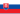 Red and blue rectangular flag with a white crescent and star symbol in the center, representing a national emblem.