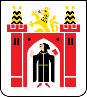 Coat of arms featuring a red castle with two towers, a golden lion on top, and a monk holding a book inside the archway