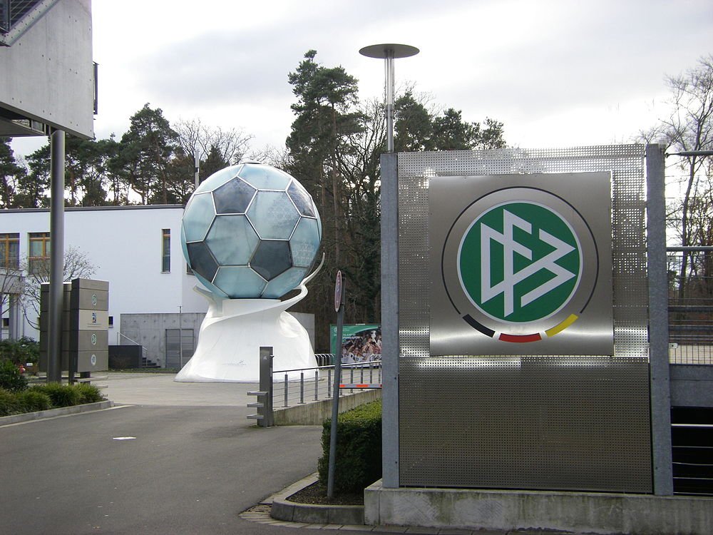 Soccer ball sculpture at German Football Association HQ Large soccer ball sculpture outside the German Football Association headquarters with modern building and trees