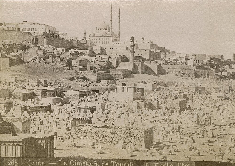 Tourah Cemetery in Cairo with mosque view Historic panoramic view of Tourah Cemetery in Cairo with ancient tombstones and mosque in background