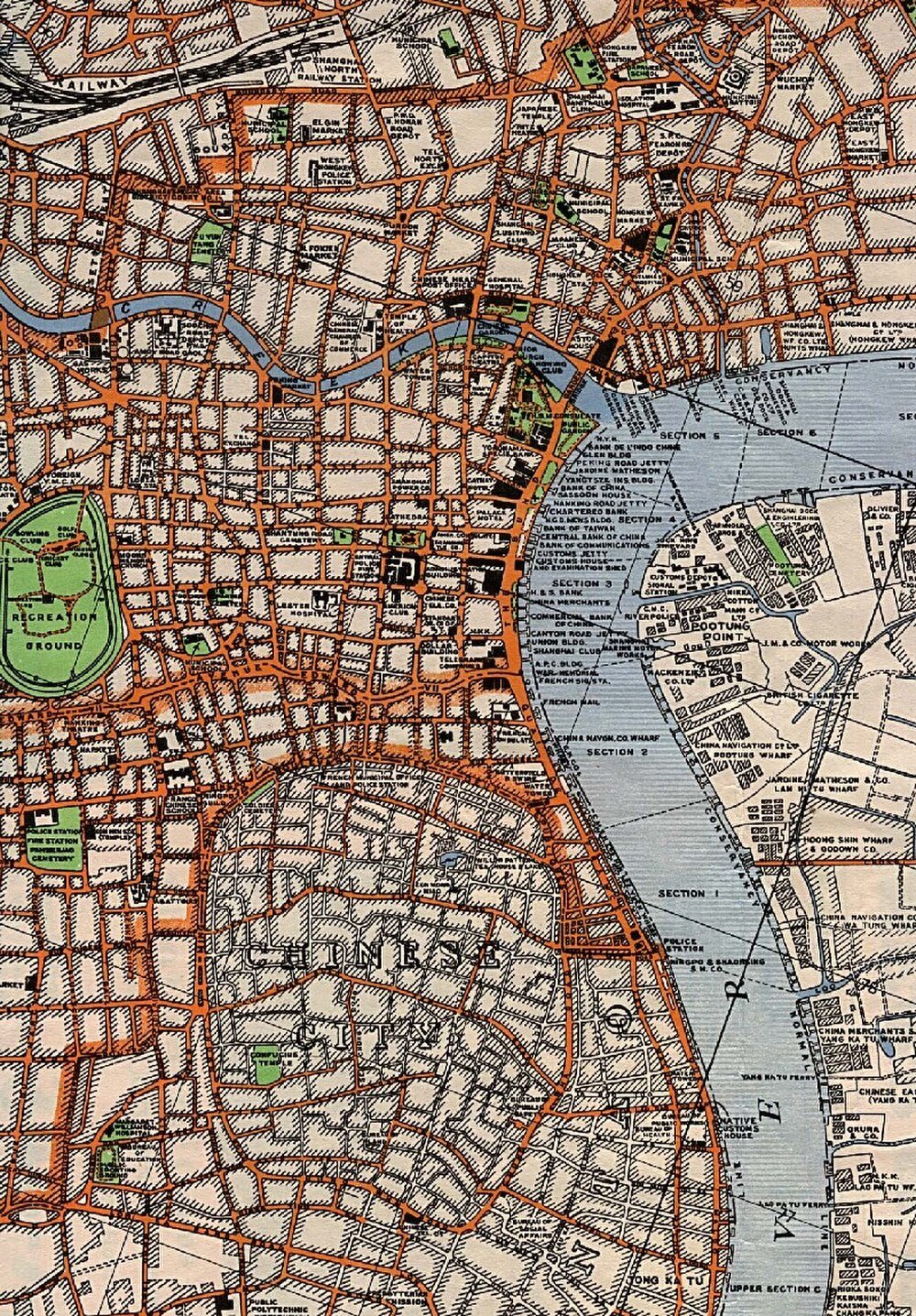 Vintage detailed map of Shanghai city showing Chinese City, recreation ground, docks, railways, and various landmarks.