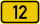 Yellow rectangular road sign with black border displaying the number 12, indicating a route or highway number.