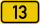 Yellow rectangular road sign with black border displaying the number 13, commonly used for route identification.