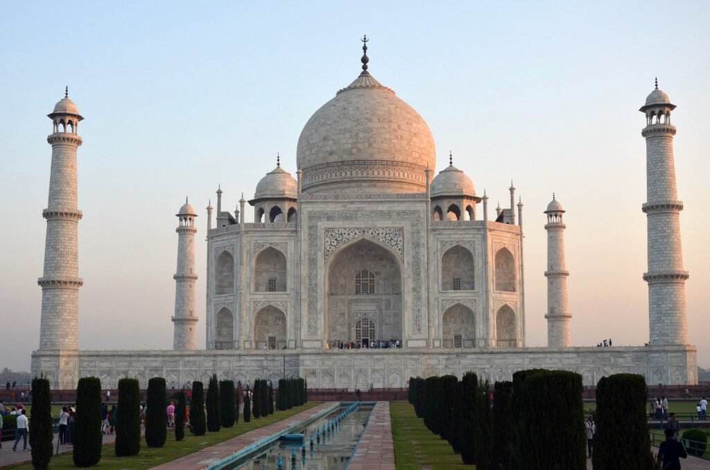 The iconic Taj Mahal in Agra at sunset with its white marble