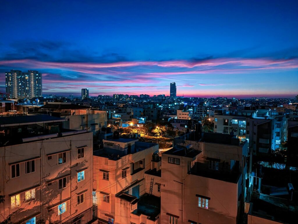 Stunning view of the Bengaluru cityscape illuminated at dusk — the modern skyline of India's Silicon Valley showcasing the tech-and-tradition combination of South India's most prosperous city