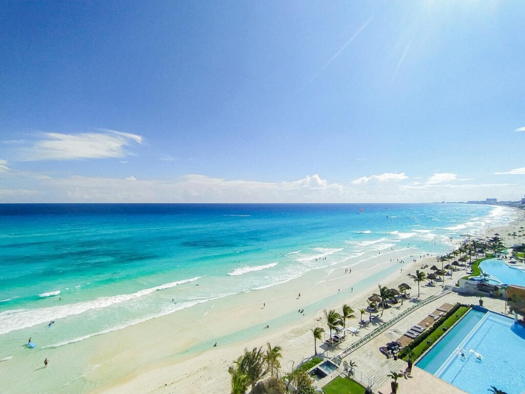Stunning aerial view of Cancun's Hotel Zone barrier island with turquoise waters and resorts