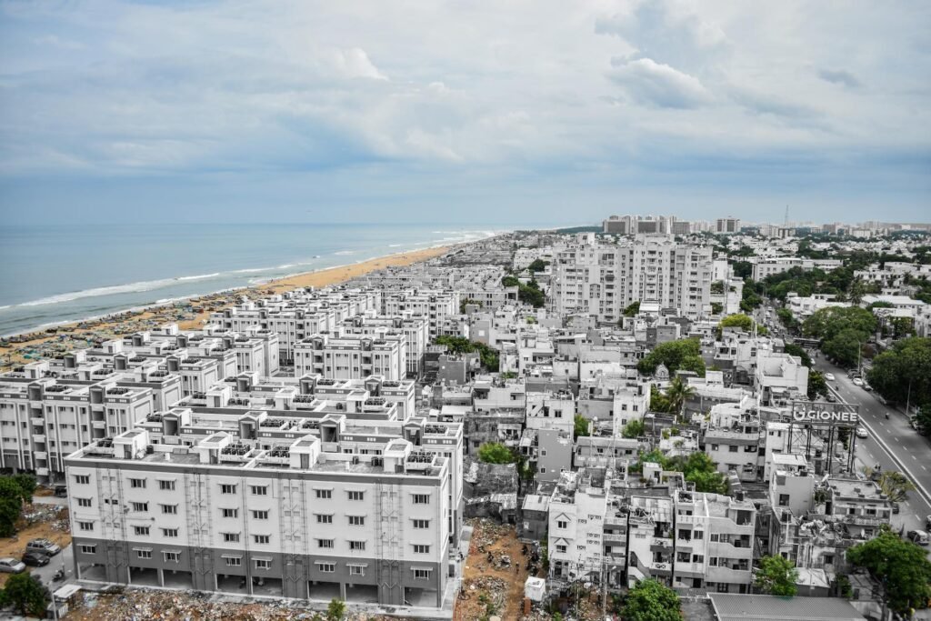 Aerial view of Chennai's urban landscape with the 13km-long Marina Beach in the background — one of the world's longest urban beaches