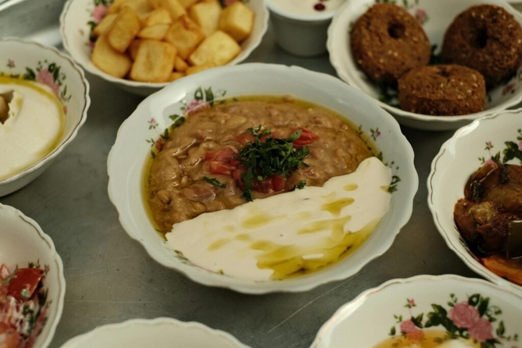An authentic Middle Eastern mezze platter with falafel, hummus, and accompaniments — typical Dubai restaurant fare