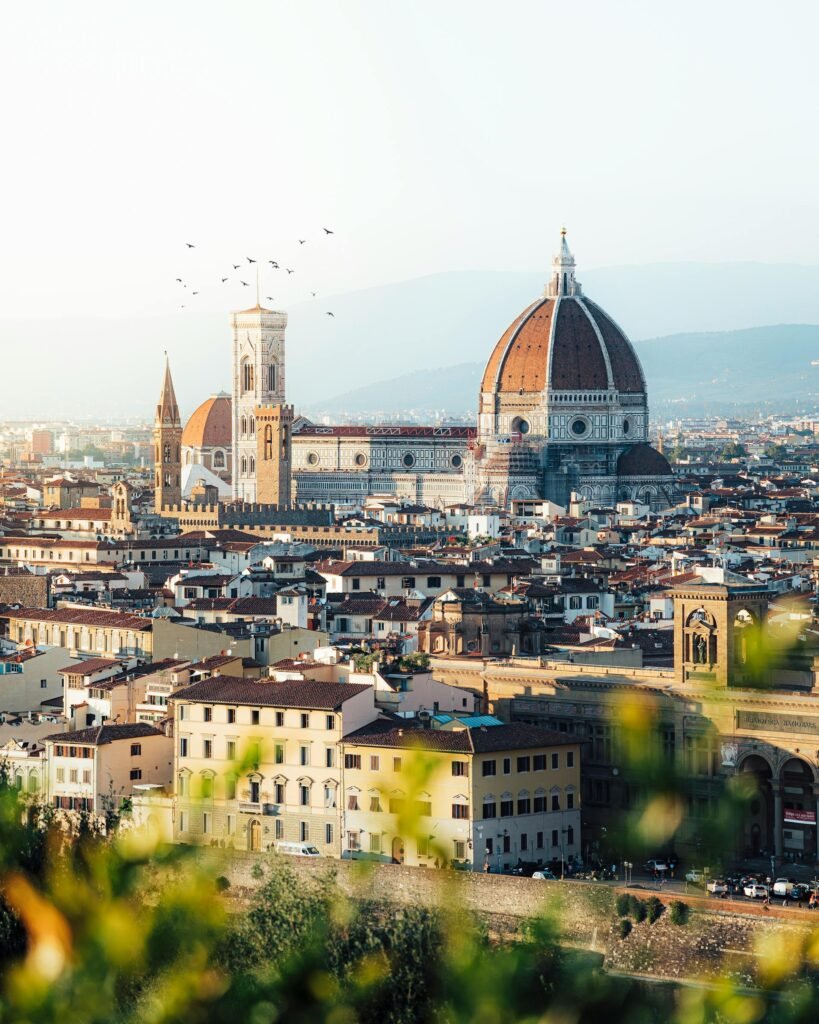 Captivating view of the Florence cityscape with the Santa Maria del Fiore Cathedral (Duomo) and Brunelleschi's iconic red-tiled dome — the architectural symbol of the Italian Renaissance