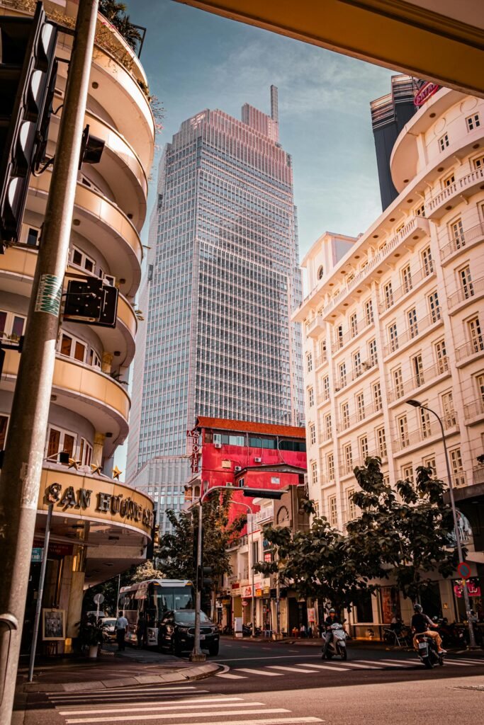 Captivating street view of Ho Chi Minh City with modern skyscrapers under a clear blue sky