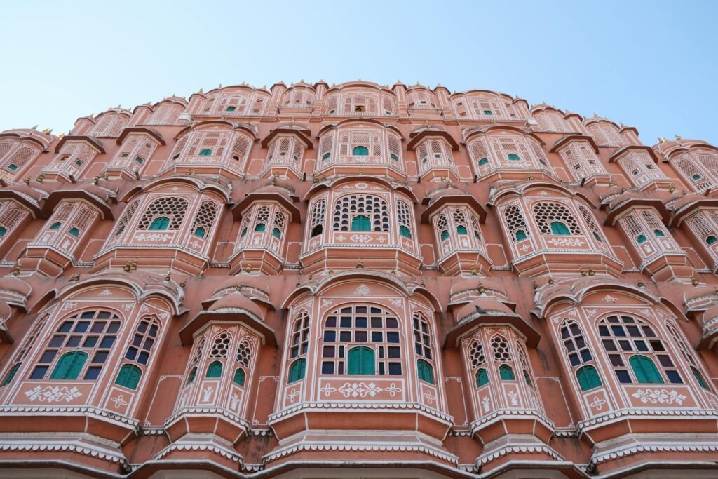 Close-up of the iconic pink sandstone facade of Hawa Mahal — the Palace of Winds in Jaipur