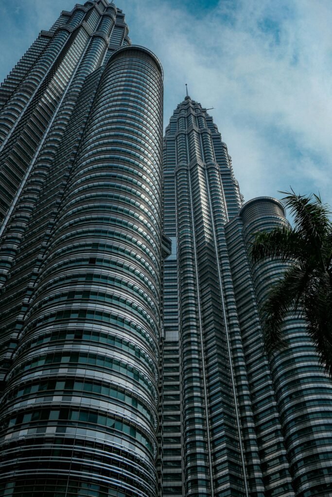 The Petronas Twin Towers in daytime in Kuala Lumpur, the 452-meter symbol of Malaysia's modern economic ambitions