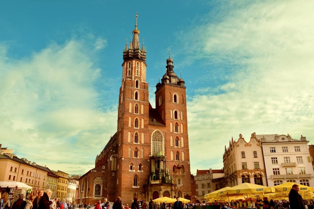 St. Mary's Basilica towering over Krakow's bustling Main Market Square