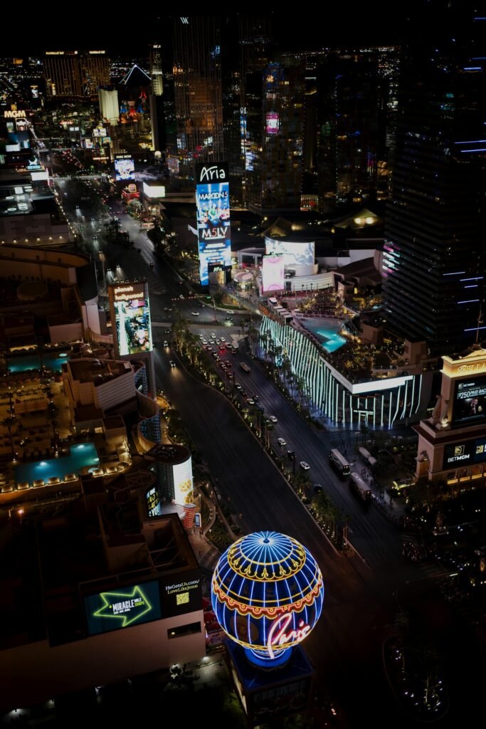 Spectacular aerial night view of the Las Vegas Strip showcasing neon lights and bustling nightlife activity