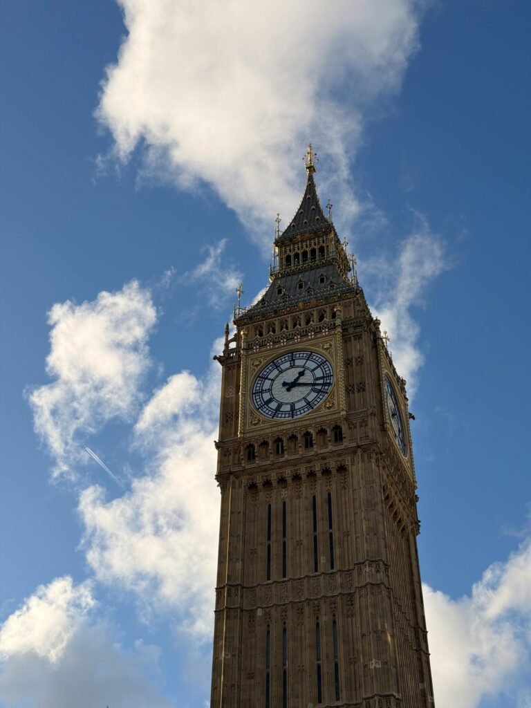 Stunning view of Big Ben clock tower in London Westminster district with dramatic clouds