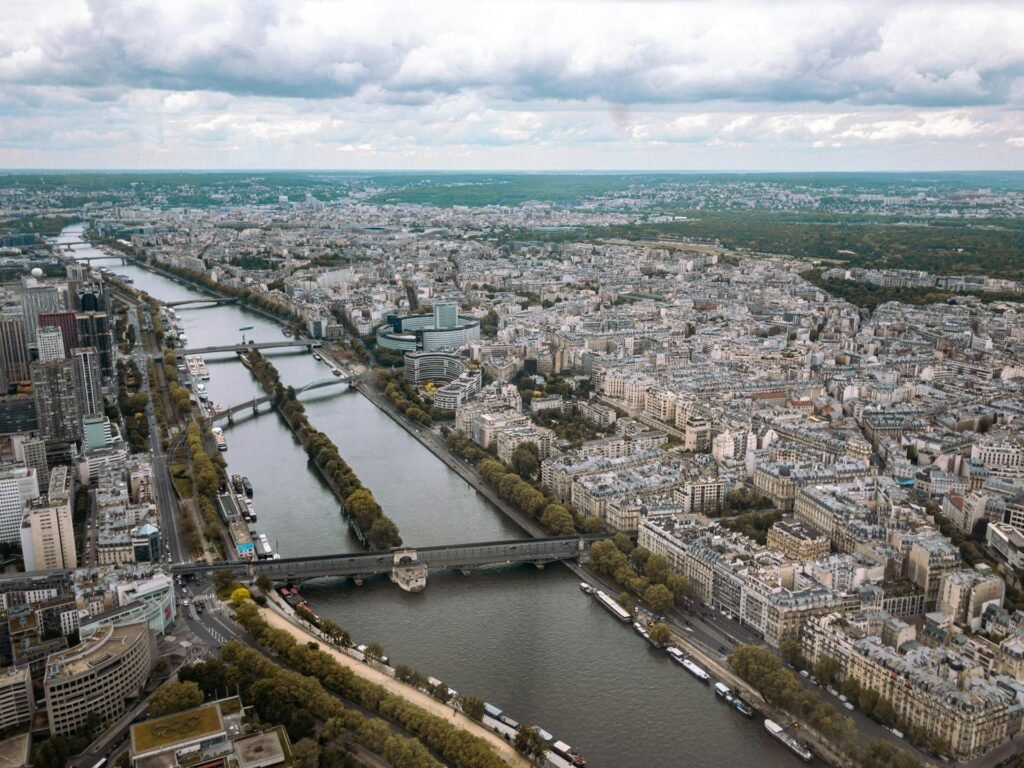 Aerial view of Paris showcasing the Seine River winding through the cityscape